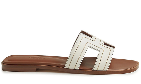 Hermès Oran slides "White" – Accessorio premium elegante