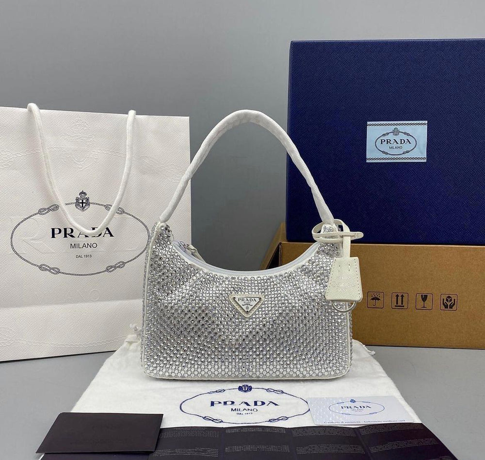 PRADA MINI BORSA IN RE-NYLON – Accessorio premium elegante