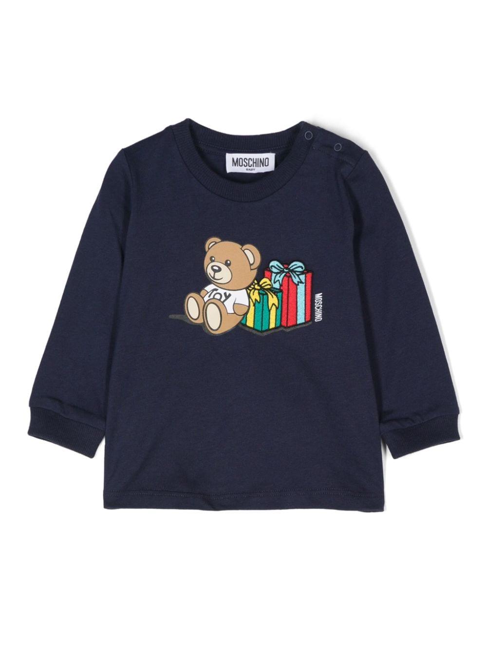 T-shirt per neonati Moschino Kids blu con stampa Teddy Bear – Accessorio premium elegante