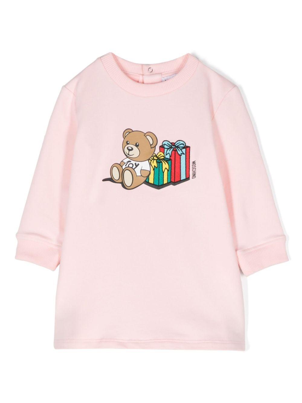 Abito per neonata Moschino Kids rosa con stampa Teddy Bear – Accessorio premium elegante