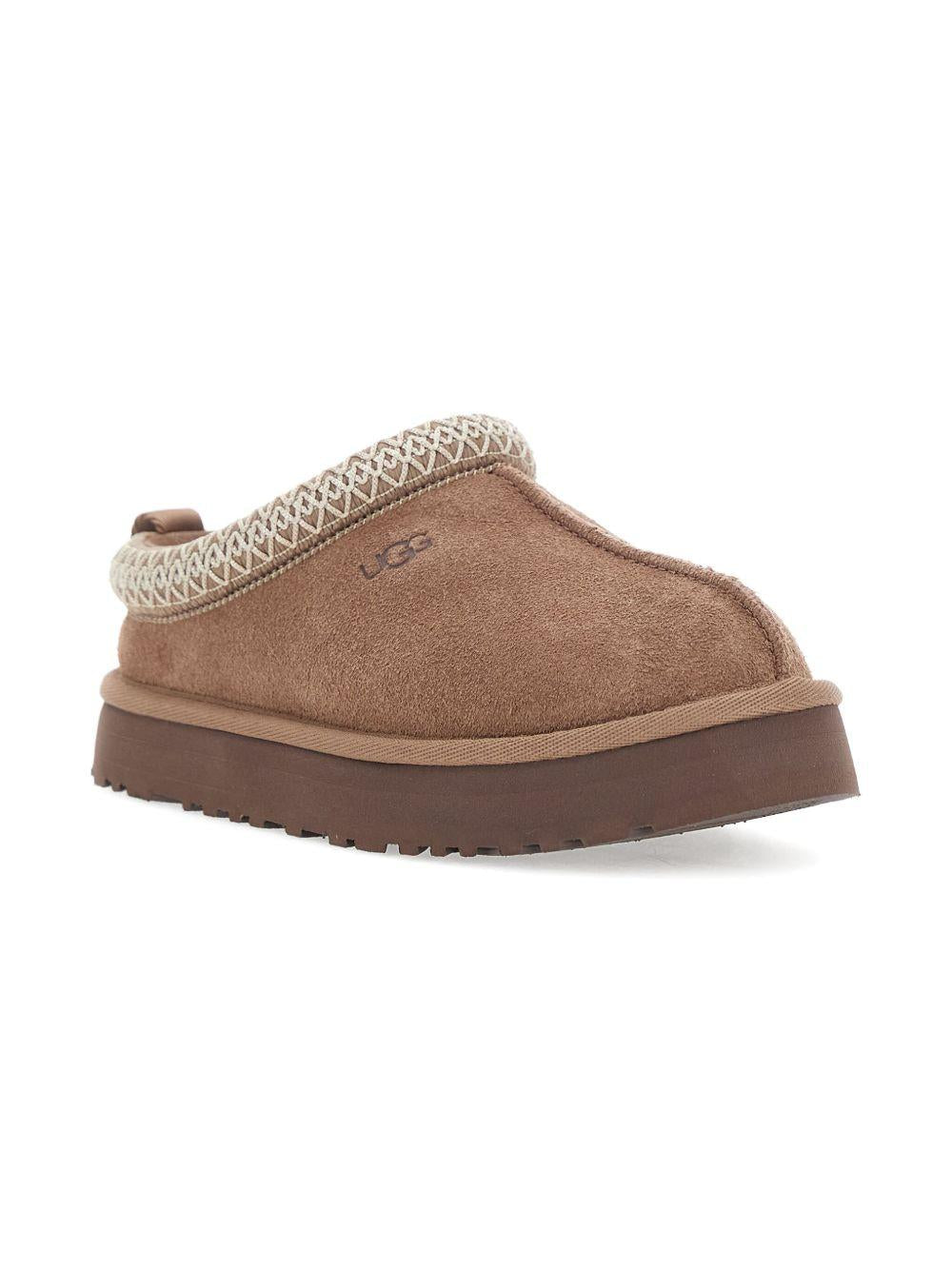 Slippers Tazz per bambini UGG Kids beige con rifiniture intrecciate – Accessorio premium elegante