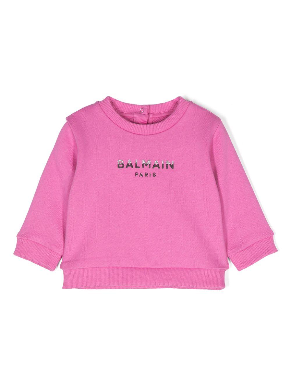 Felpa con logo goffrato per neonata Balmain Kids rosa con trama jersey – Accessorio premium elegante