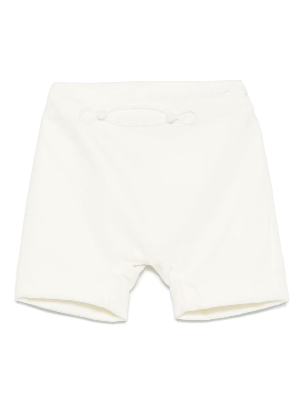 Shorts per neonato Jesurum Baby bianco in velluto con bottoni decorativi – Accessorio premium elegante