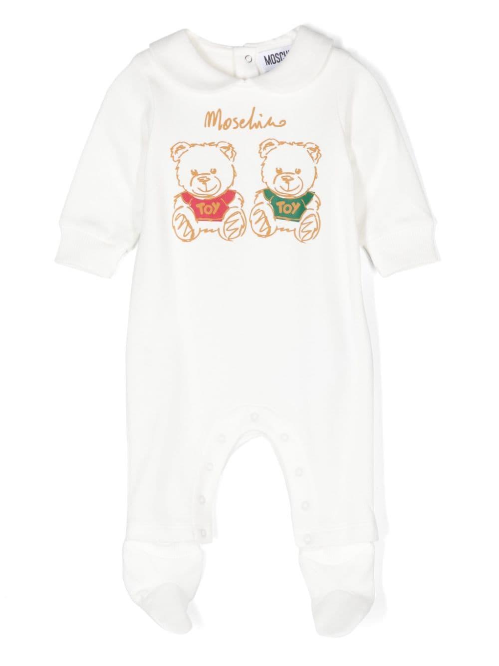 Pigiama per neonati Moschino Kids bianco con stampa Teddy Bear – Accessorio premium elegante