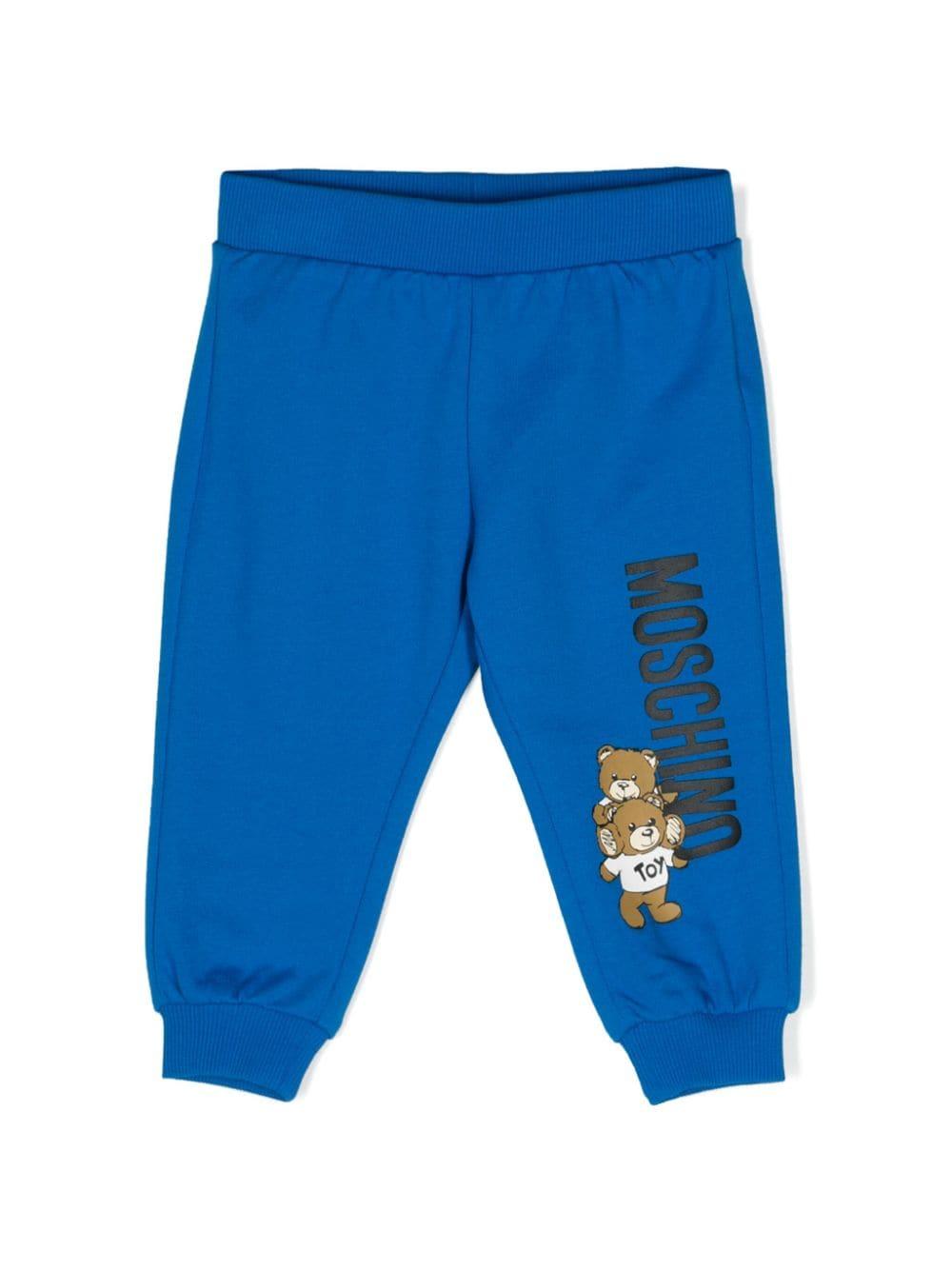 Pantaloni sportivi per neonati Moschino Kids blu con motivo Teddy Bear – Accessorio premium elegante