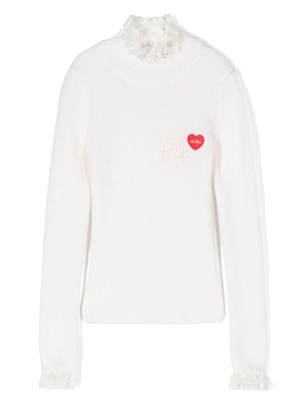 Maglione collo alto con ricamo – Accessorio premium elegante