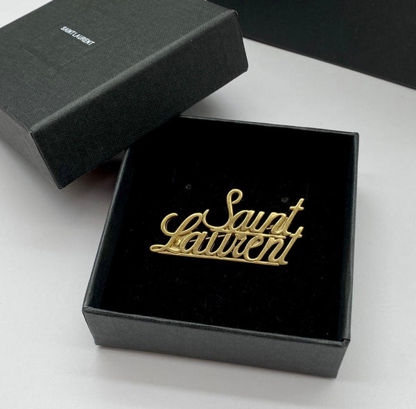 Broche Yves Saint Laurent – Accessorio premium elegante