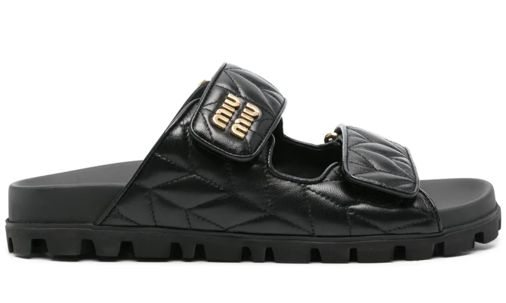 Miu Miu Matelassé Nappa Leather Slides "Black" – Accessorio premium elegante