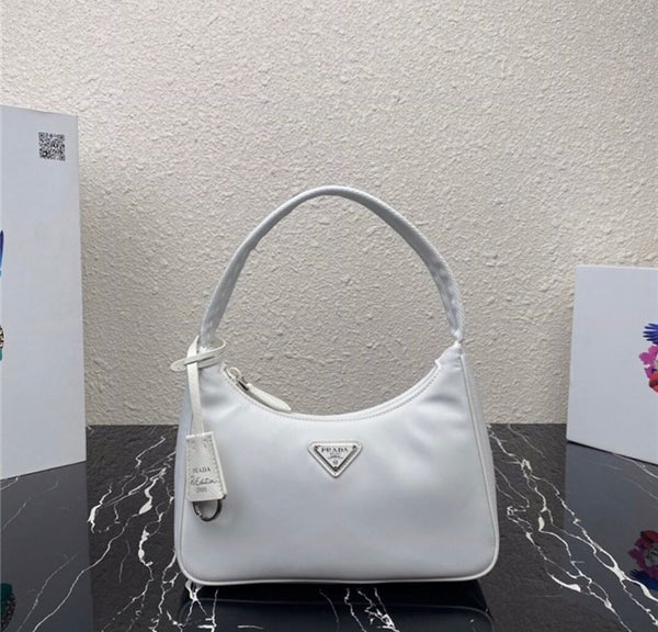 PRADA MINI BORSA IN RE-NYLON – Accessorio premium elegante