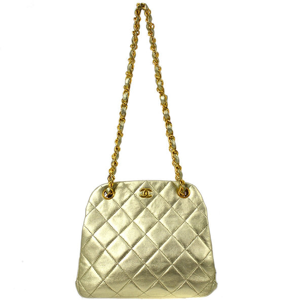 CHANEL 1989-1991 Gold Lambskin Kisslock Shoulder Bag – Accessorio premium elegante