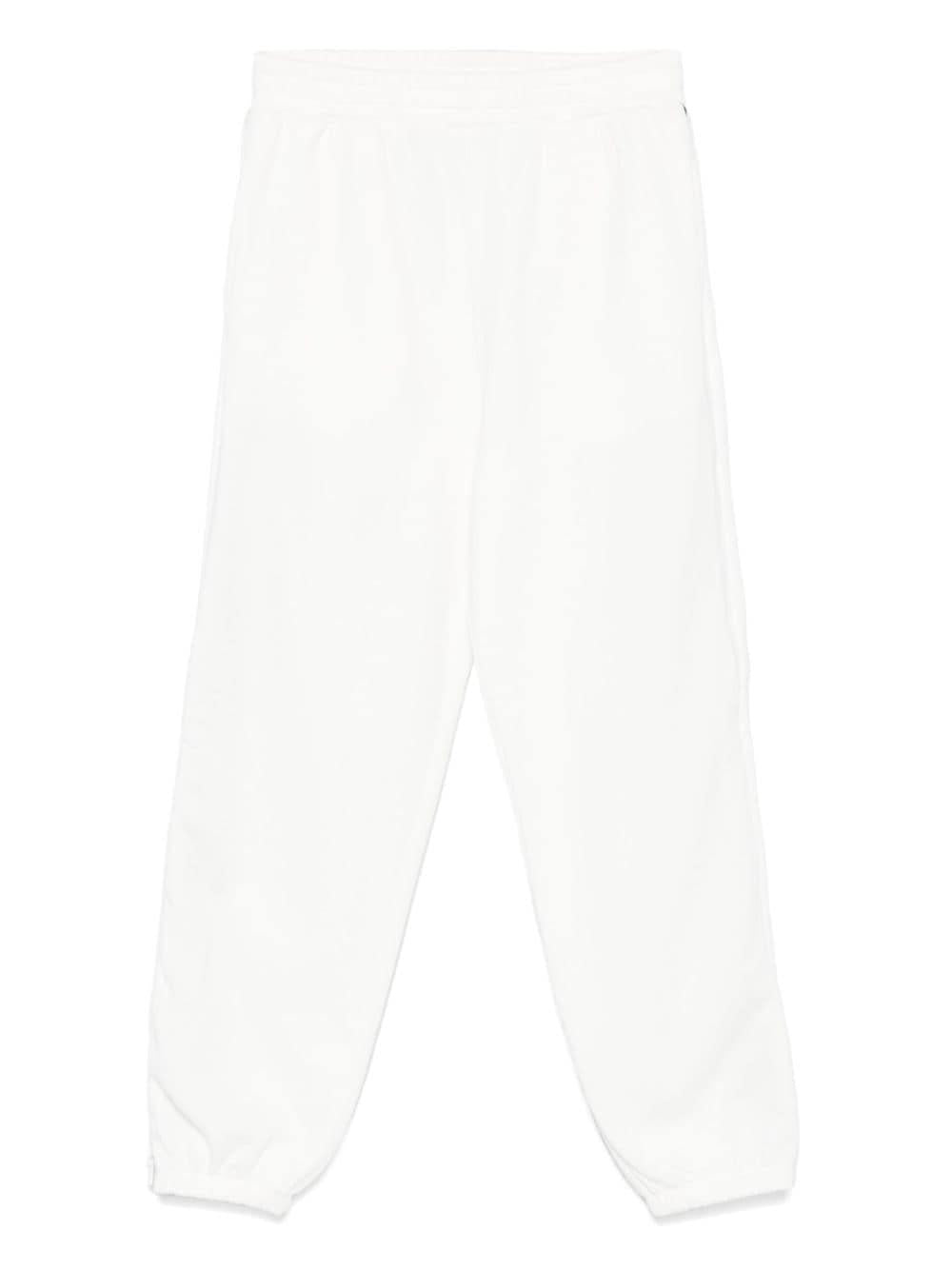 Pantaloni sportivi per bambino Stella McCartney Kids bianco con zip e decorazione sulla manica – Accessorio premium elegante