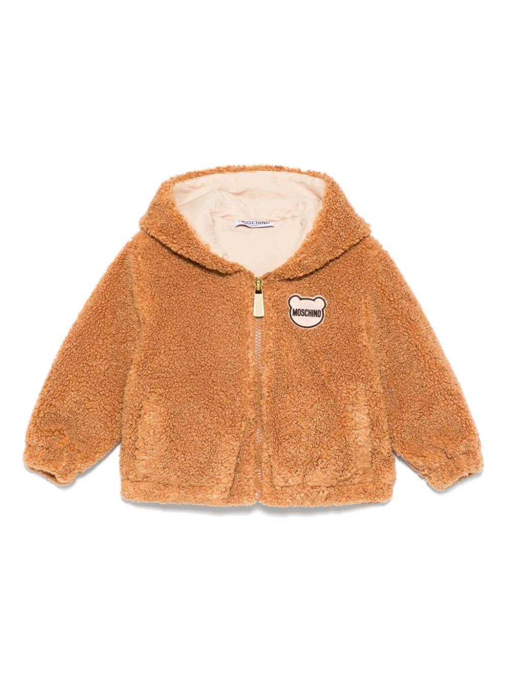 Giubbino in pelliccia sintetica per neonata Moschino Kids marrone con chiusura lampo – Accessorio premium elegante