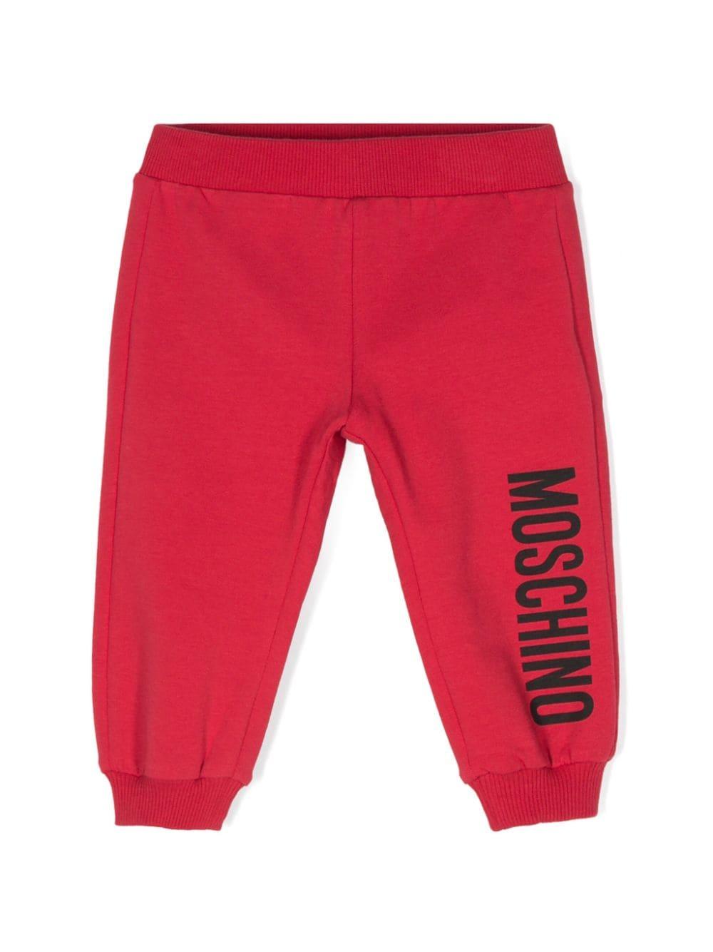 Pantaloni sportivi per neonati Moschino Kids rosso con logo sulla gamba – Accessorio premium elegante