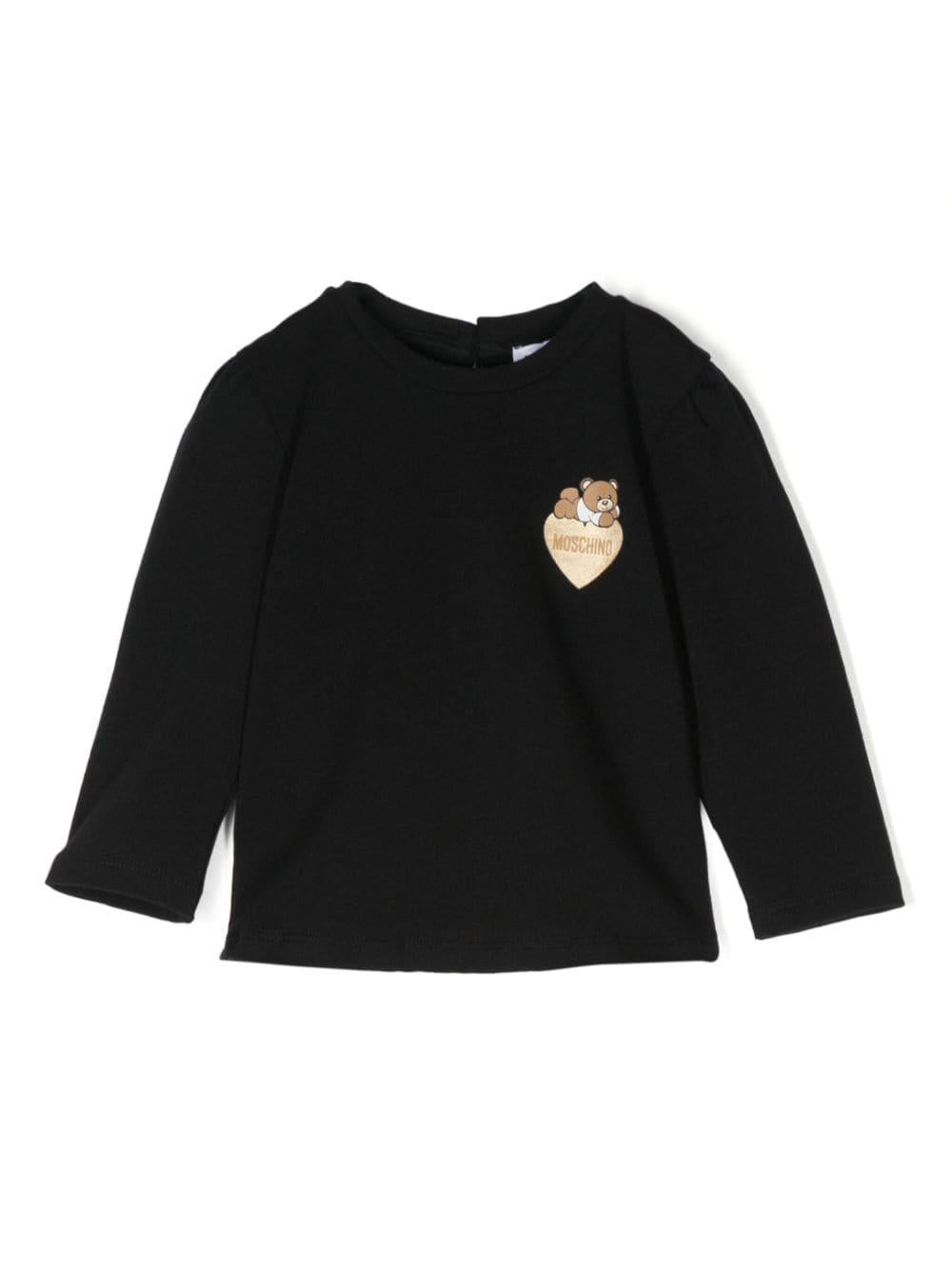 T-shirt per neonata nera Moschino Kids con stemma Teddy Bear e cuoricino – Accessorio premium elegante