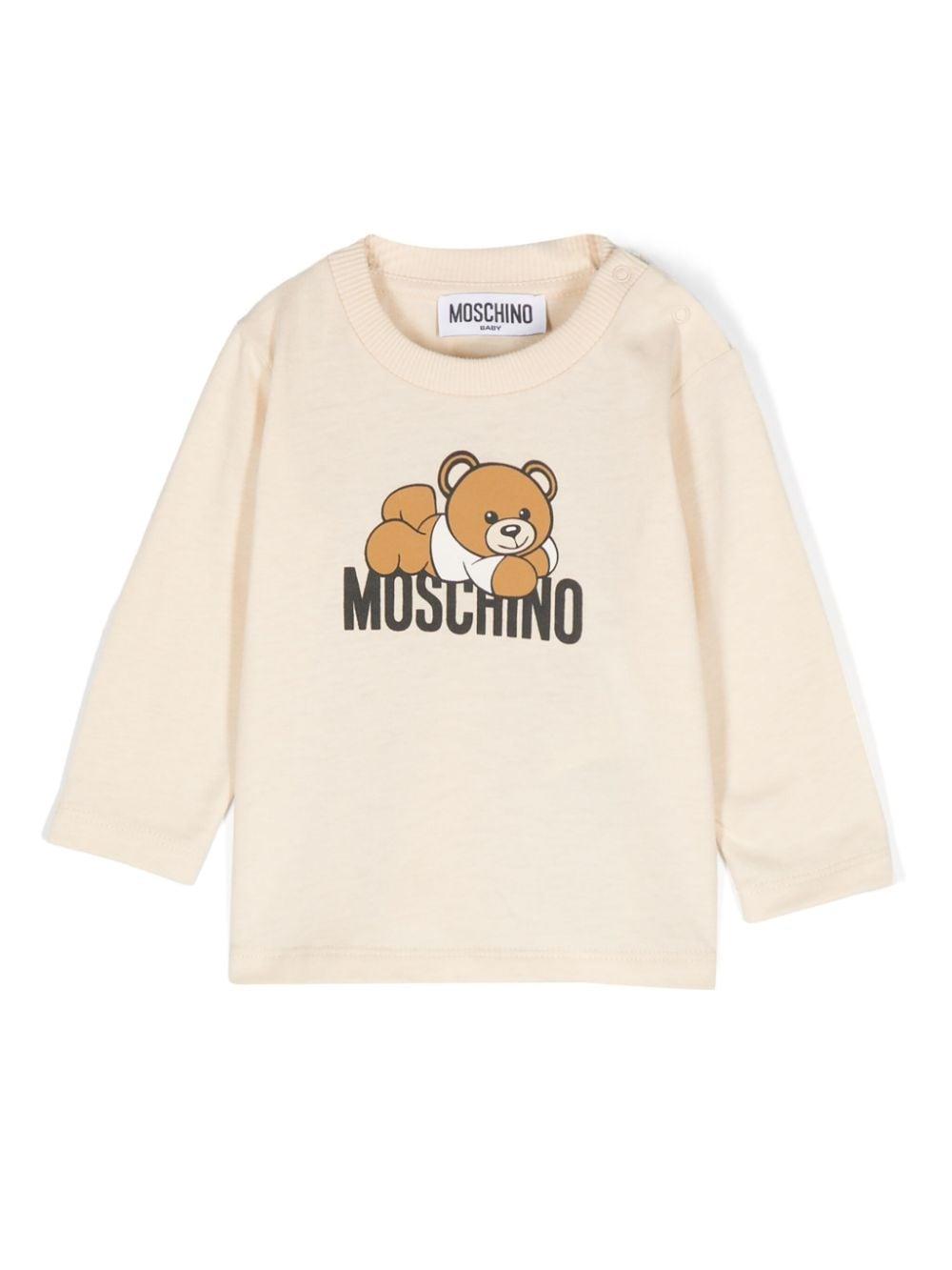 T-shirt per neonati Moschino Kids beige a maniche lunghe con stampa logo – Accessorio premium elegante