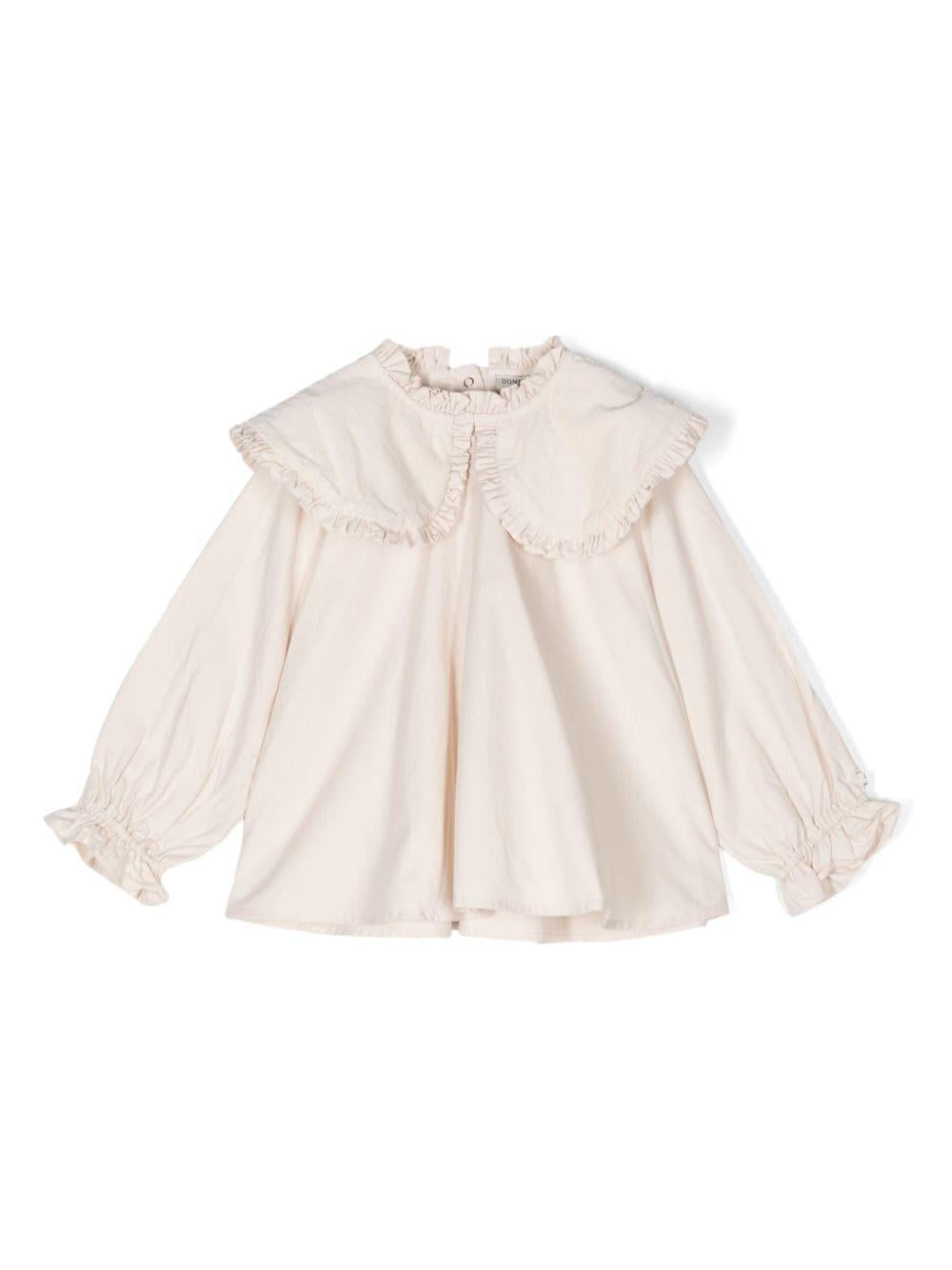 Blusa per bambina Donsje Mellys beige con dettagli ruches e colletto con pettorina – Accessorio premium elegante