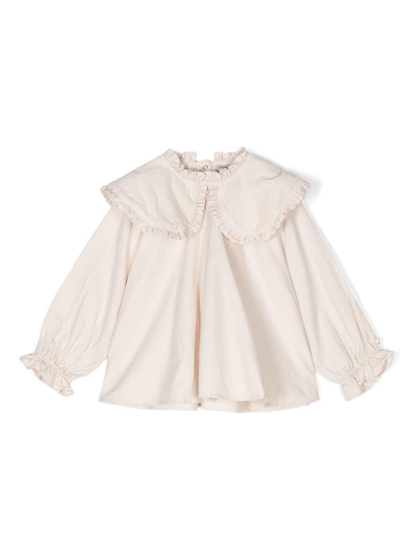 Blusa per bambina Donsje Mellys beige con dettagli ruches e colletto con pettorina – Accessorio premium elegante