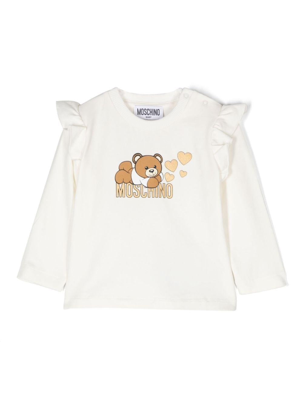 T-shirt per neonata Moschino Kids bianco con stampa Teddy Bear e ruches – Accessorio premium elegante