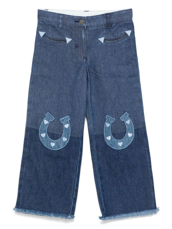 Jeans per bambina Stella McCartney Kids  in denim blu con applicazione sul davanti – Accessorio premium elegante