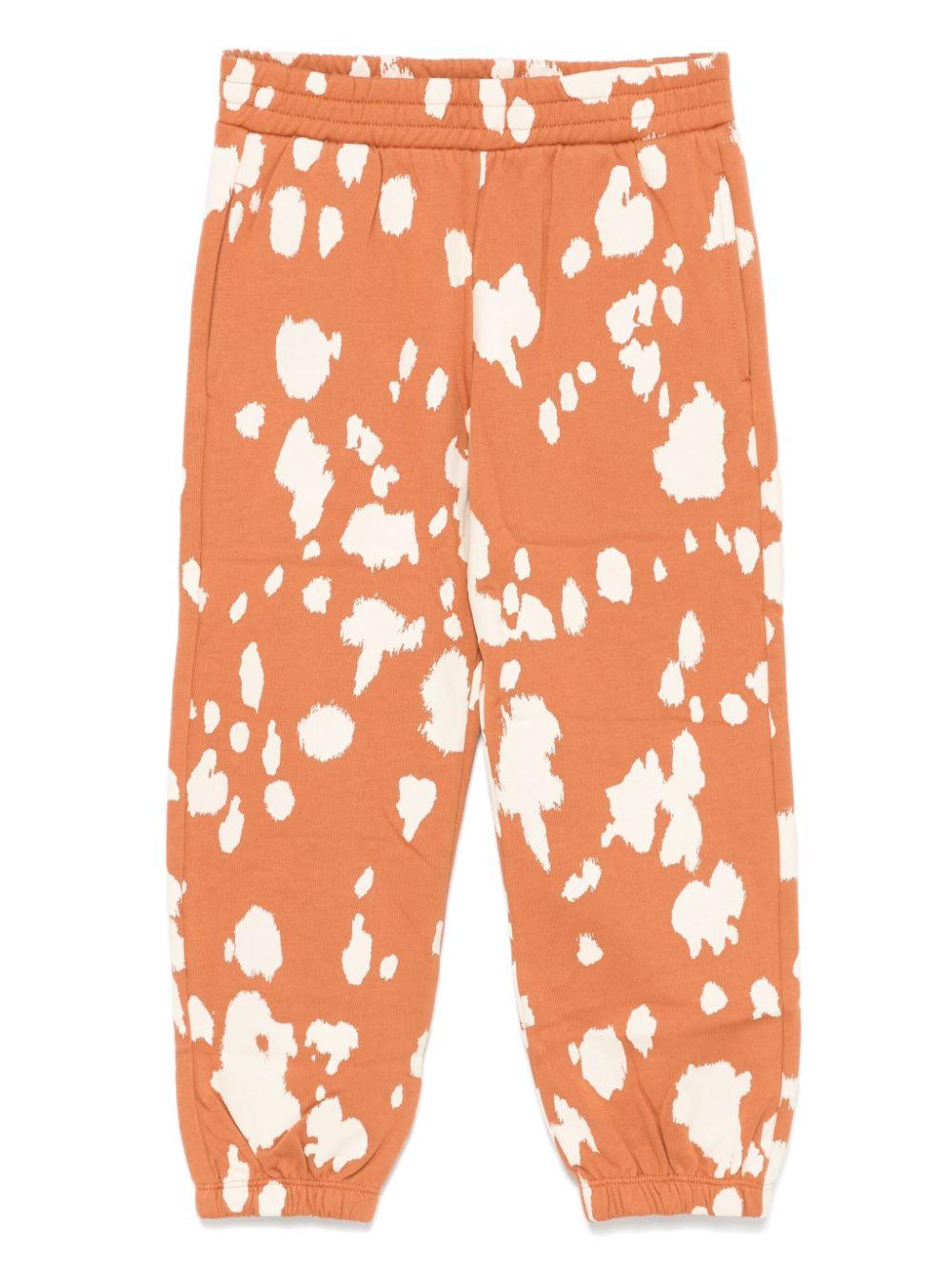 Pantaloni sportivi arancioni per bambina con stampa all over Stella McCartney Kids – Accessorio premium elegante