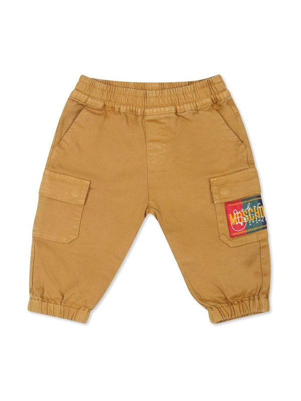 Pantaloni per neonato Moschino Kids marroni con applicazione logo – Accessorio premium elegante