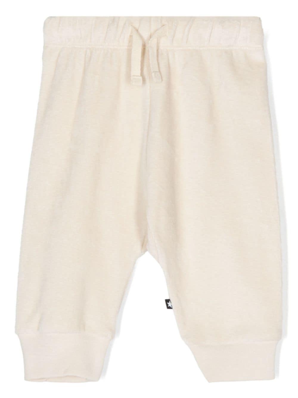 Pantaloni sportivi per neonato Molo Sigo bianco in velluto – Accessorio premium elegante