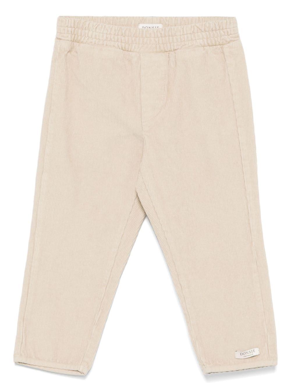 Pantaloni a disco per neonata Donsje beige con elastico in vita – Accessorio premium elegante
