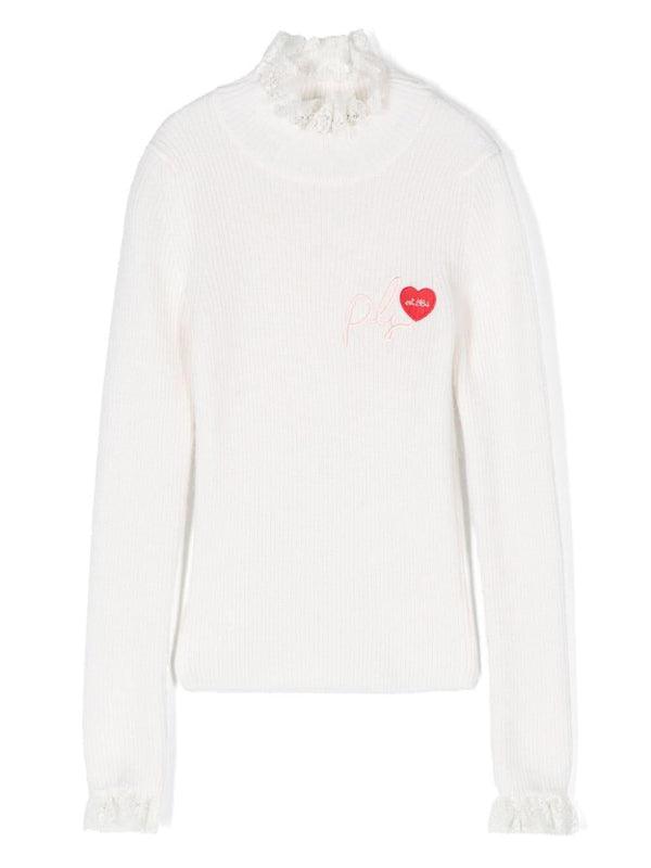 Maglione collo alto con ricamo – Accessorio premium elegante